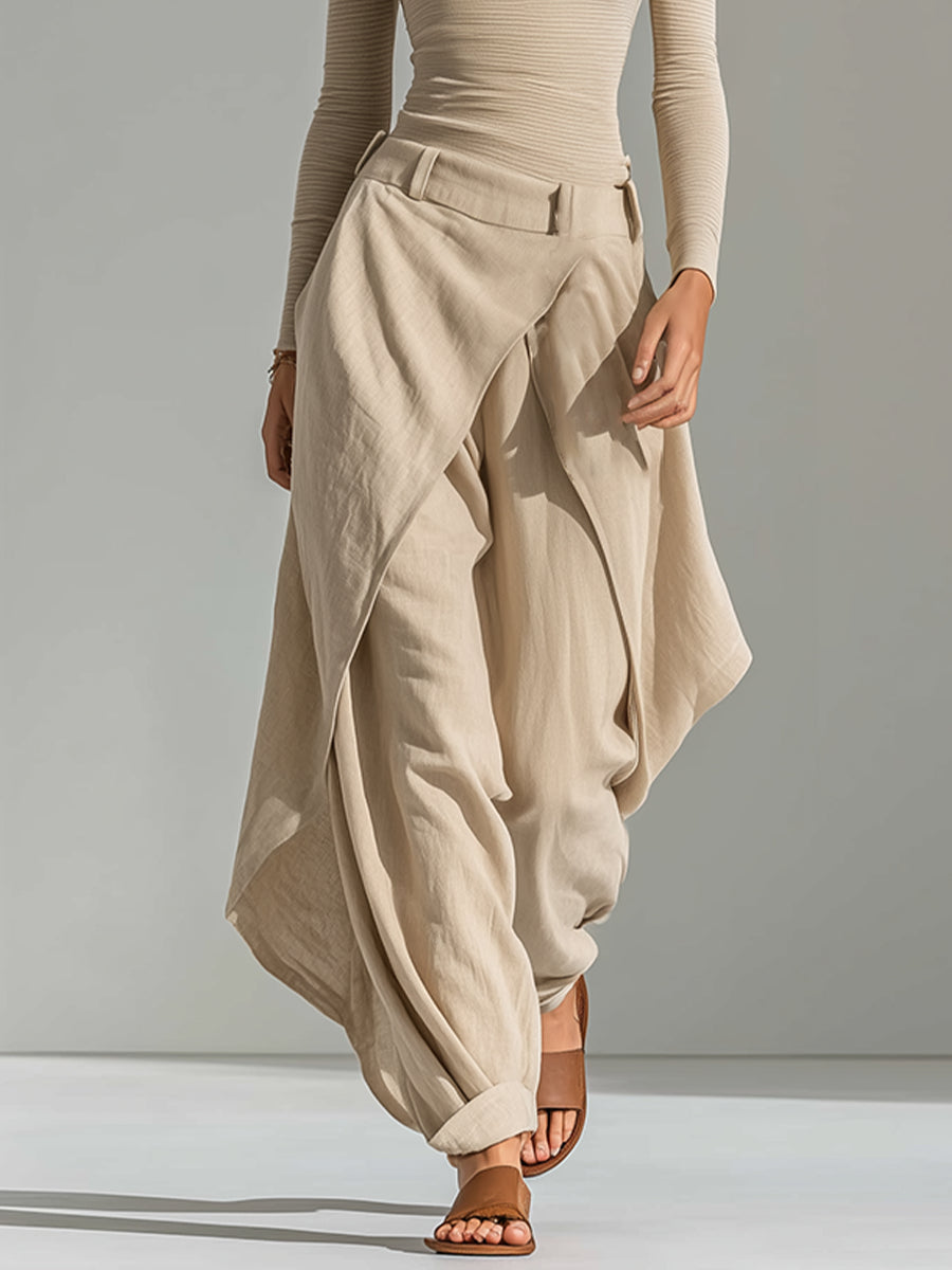 Top beige with boat neckline and wide-leg overlay pants.