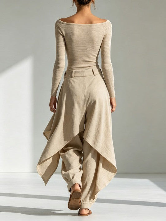 Top beige with boat neckline and wide-leg overlay pants.