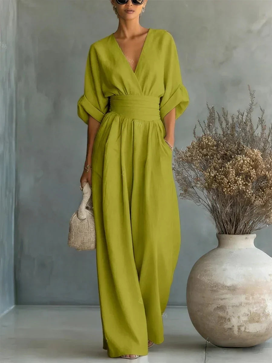 Elegant jumpsuit with V-neck, high waist, and wide leg