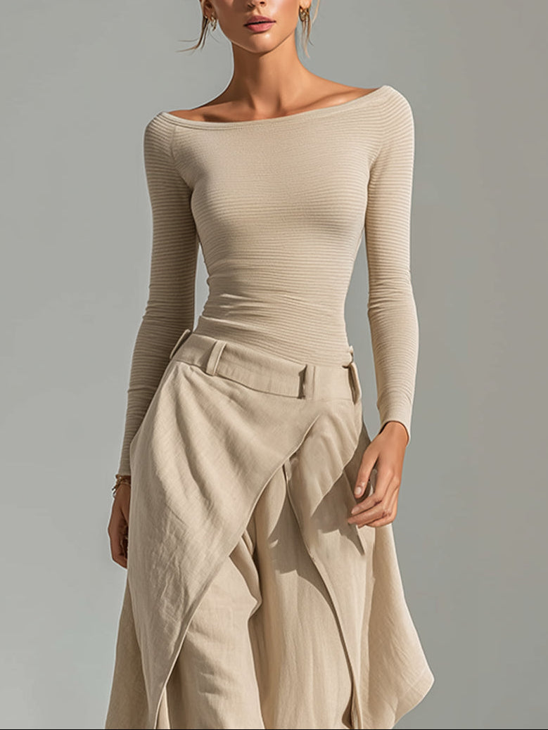 Top beige with boat neckline and wide-leg overlay pants.