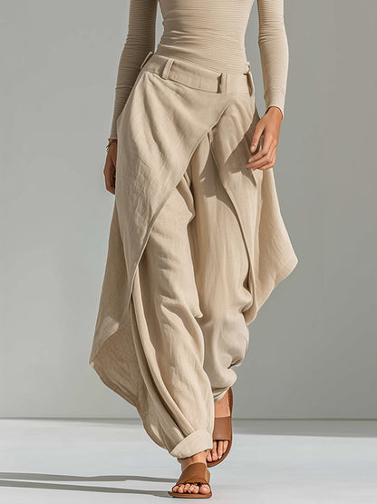 Top beige with boat neckline and wide-leg overlay pants.