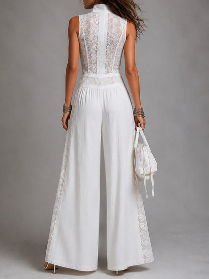 Vintage jumpsuit with high collar and wide leg with lace panels