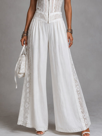 Vintage jumpsuit with high collar and wide leg with lace panels