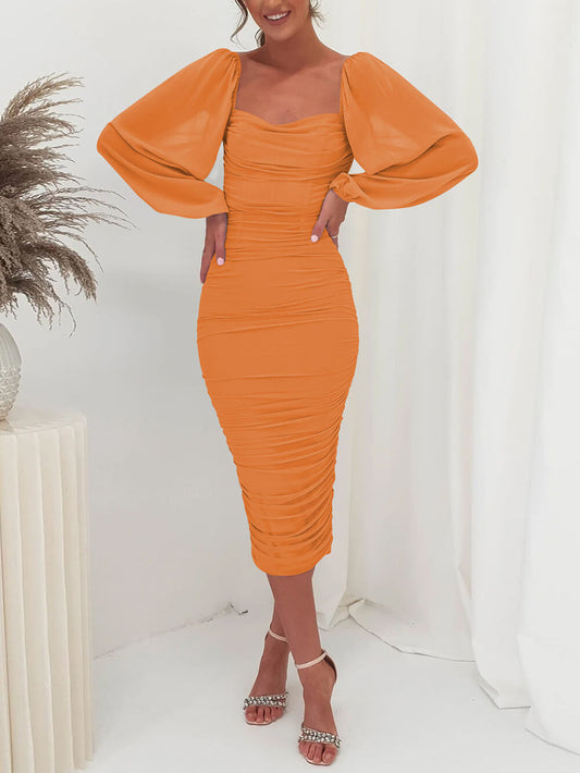 Midi pleated dress made of knitted material with long sleeves