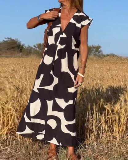 NAOMI | Long Printed Dress with V-Neck and Flared Fit for a Vacation Look