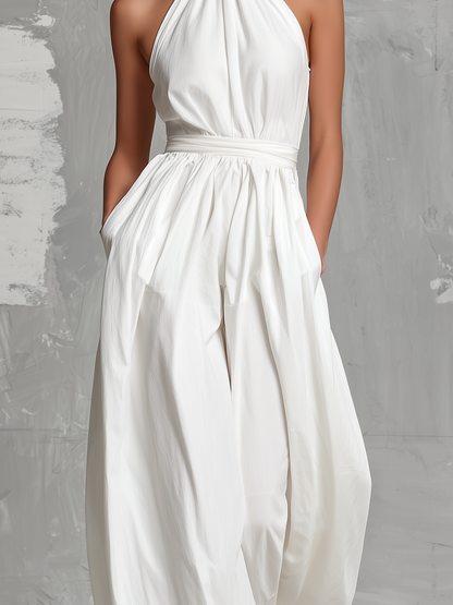 Fiamma | Elegant white jumpsuit in woven fabric with sleeveless halter neck