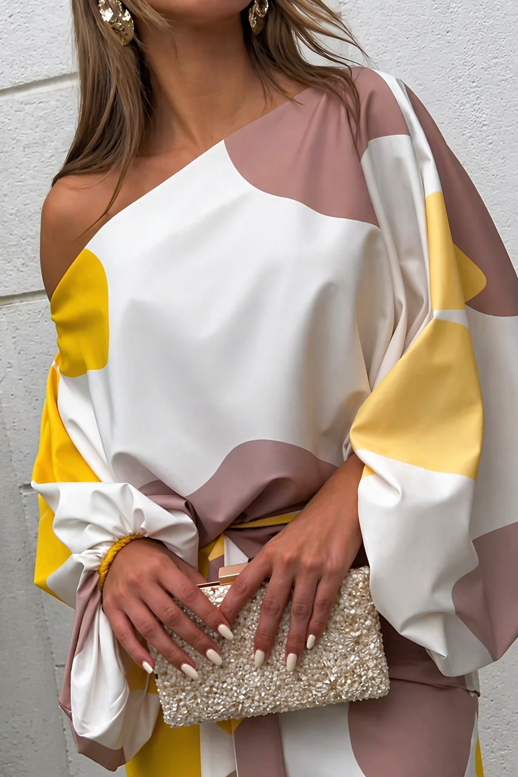 Emiliana – glamorous creation with fringes