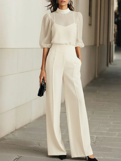 Three-piece set: sheer black tank top and wide-leg pants