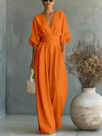Elegant jumpsuit with V-neck, high waist, and wide leg