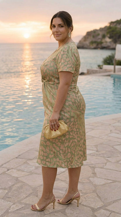 Midi slimming effect dress with central knot and fluid fall