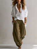 White Loose Shirt and Green Wide-Leg Lantern Pants
