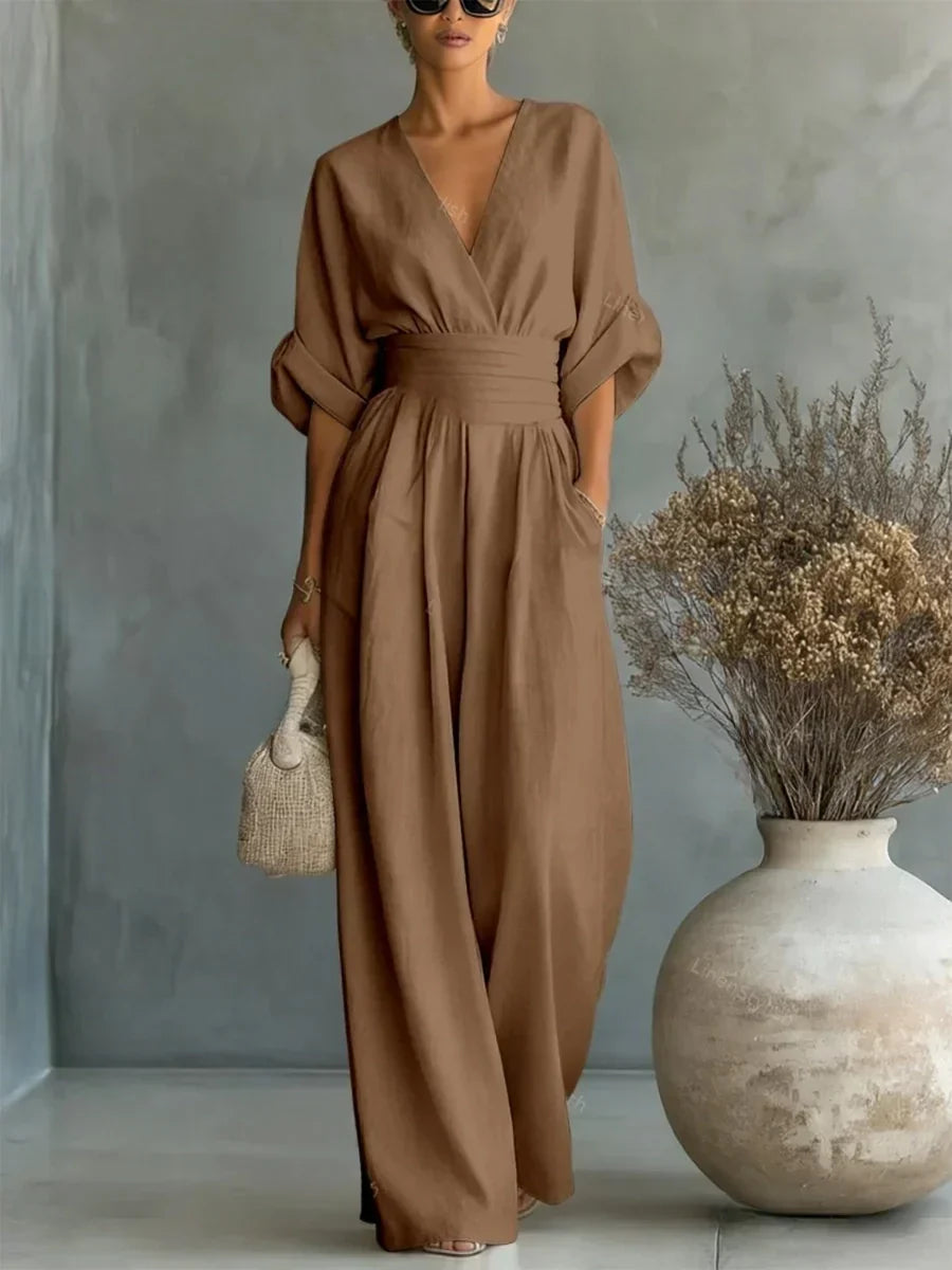 Elegant jumpsuit with V-neck, high waist, and wide leg