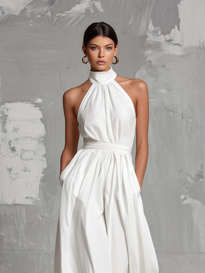 Fiamma | Elegant white jumpsuit in woven fabric with sleeveless halter neck