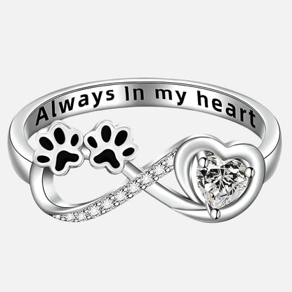 Ring with zirconia in the shape of a paw with a design in the form of a heart and infinity