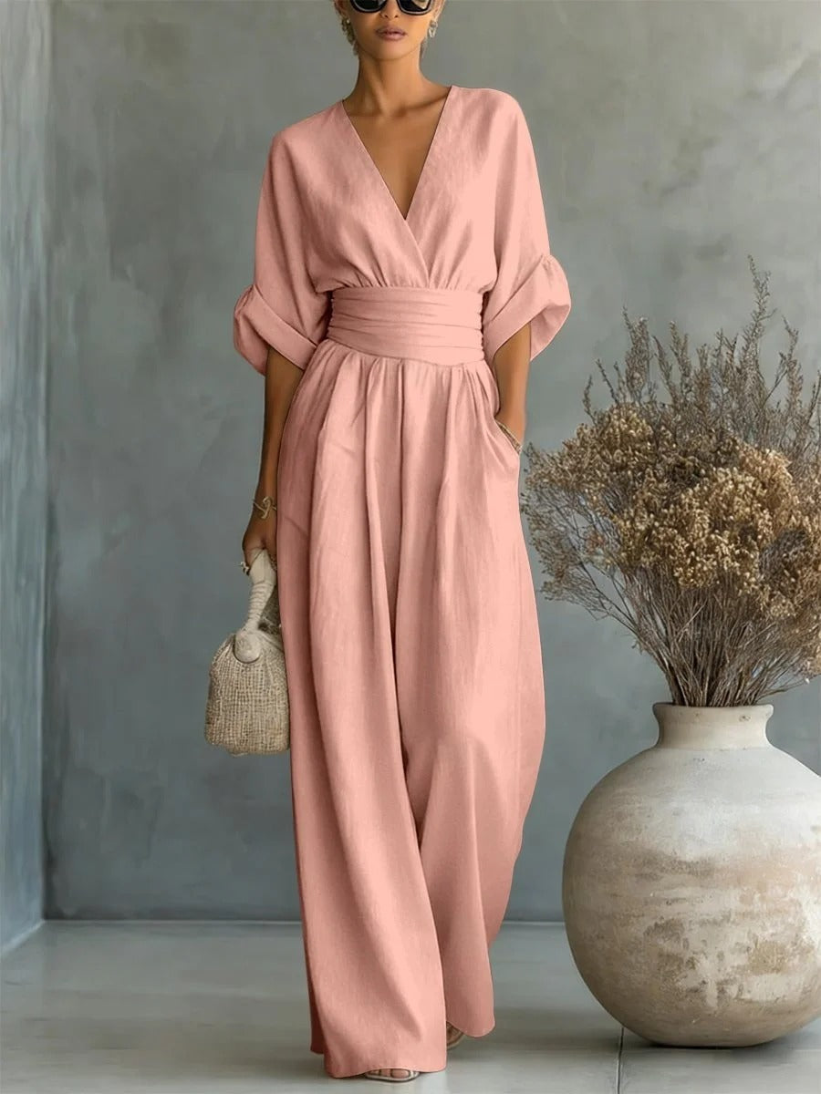 Elegant jumpsuit with V-neck, high waist, and wide leg